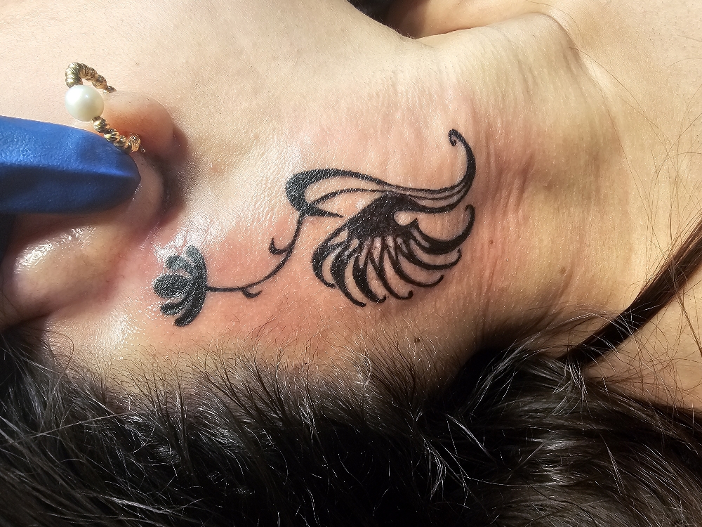 tiny tattoo