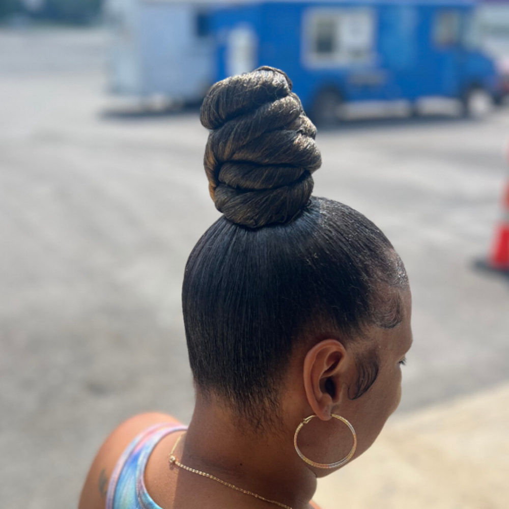high knot bun ponytail at Alizah’s Hair Salon in Indianapolis, IN