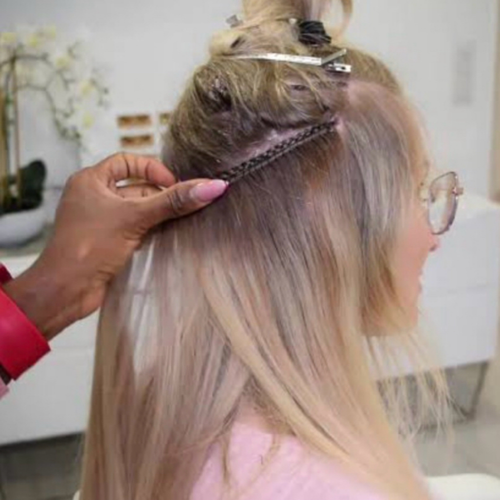 In between Sew-In at Queen’s Crown Hair in New Orleans, LA