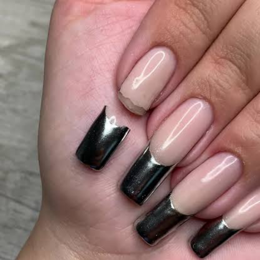 Nail repair at Vain Galore Salon & Spa in Austell, GA