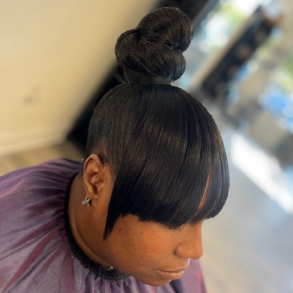 Top Knot Bun at “TheeWeaveSpecialist” in Hollywood, SC