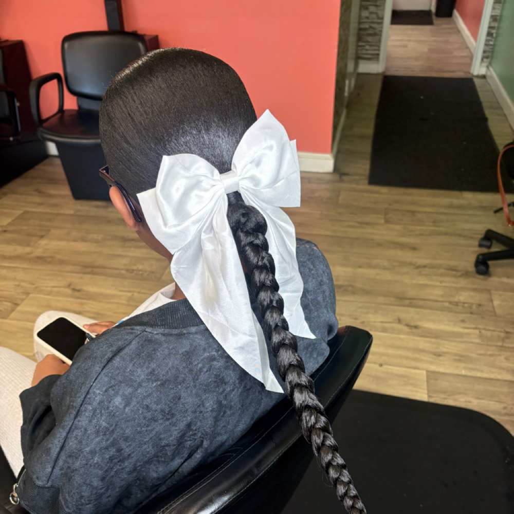 Low Slickback Ponytail at ByHarmoniiK in Augusta, GA