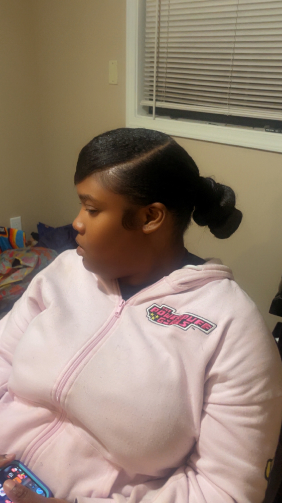 Bun at Glow Up in Millington, TN