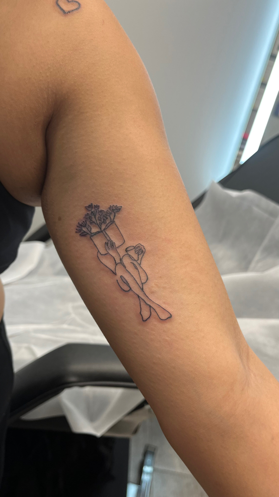 Fine-Line Tattoo