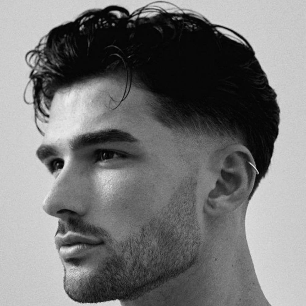 Fade haircut at The Laguna Aesthetic Hair Studio- Austin in Austin, TX
