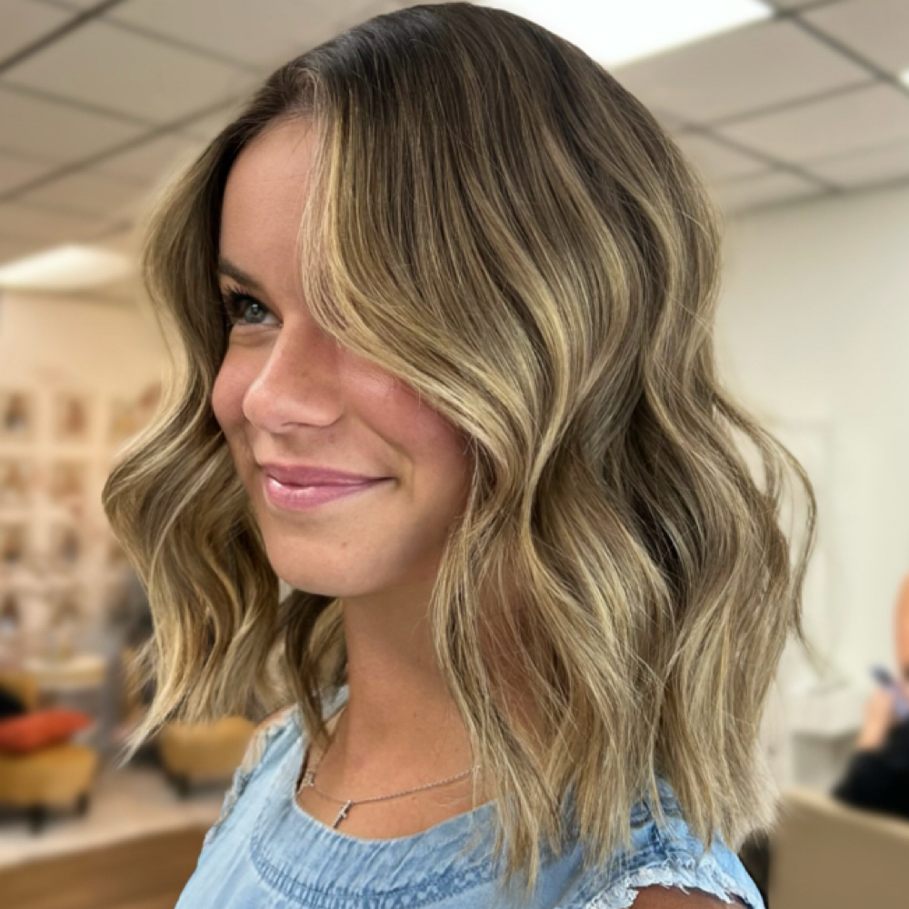 Women’s Haircut + Style at Emma @ Elleham Salon in Port Charlotte, FL
