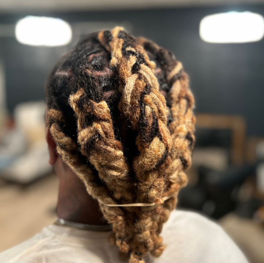 Traditional Locs Retwist at The Beauty Bar in Leland, MS