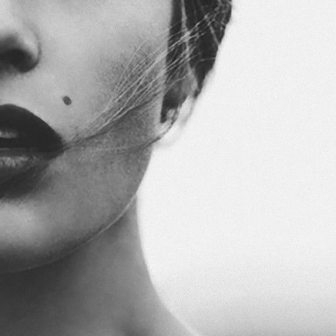 Beauty Mark Tattoo
