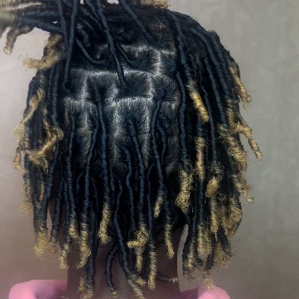 Starter Locs at Mariah The Stylist in Randallstown, MD