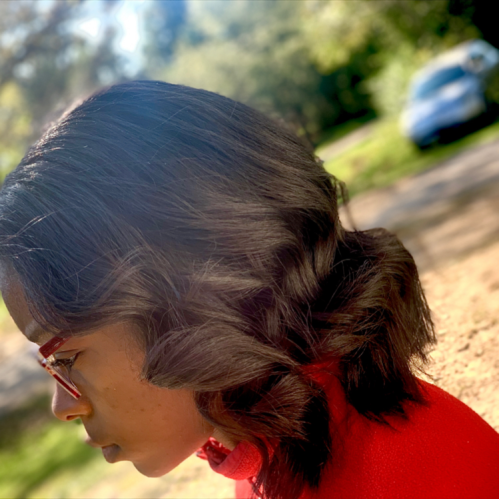 Relaxer Retouch at J. Mc Hair Studio in Hattiesburg, MS