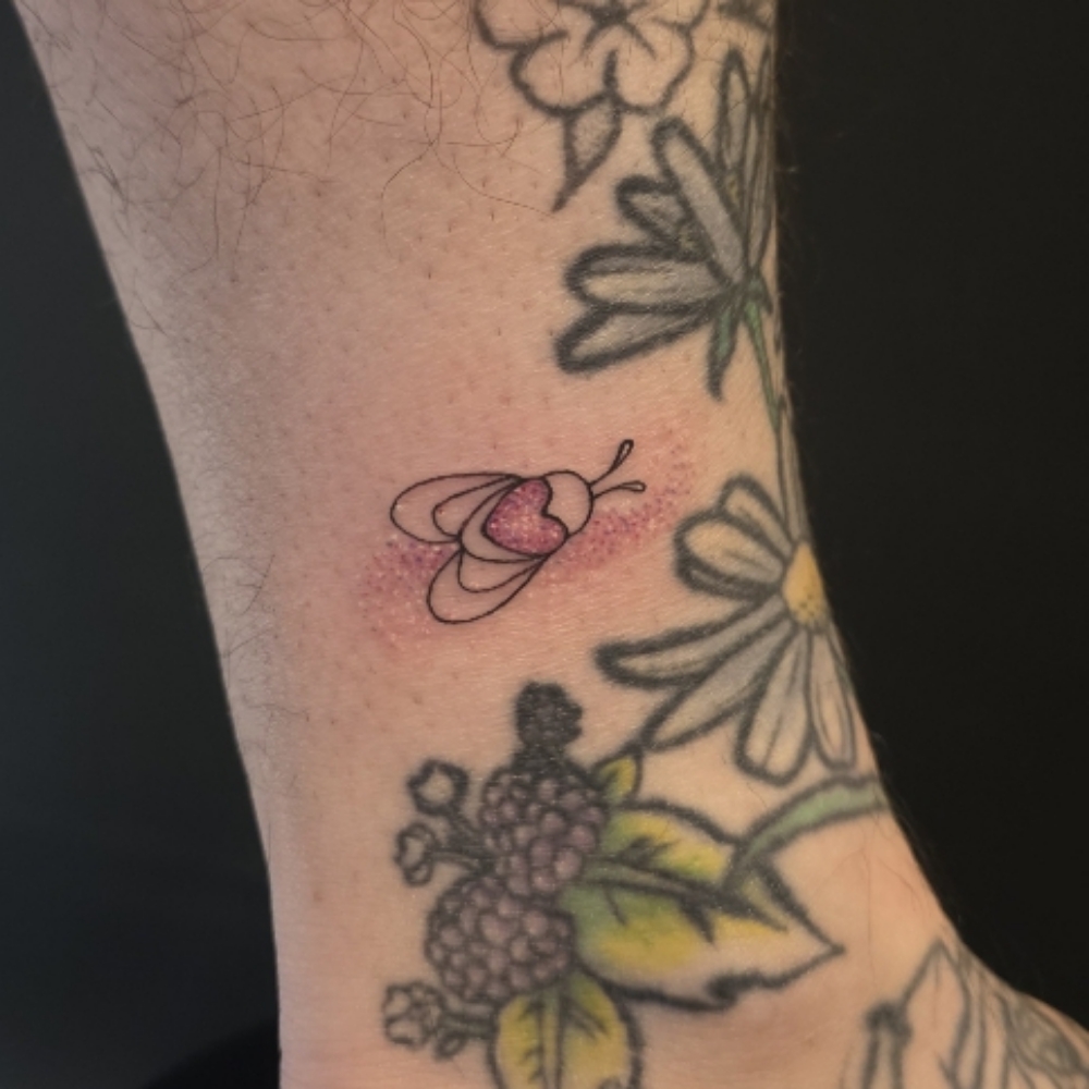 Tiny Color Tattoo at Gudeahn Art Tattoos in Englewood, CO