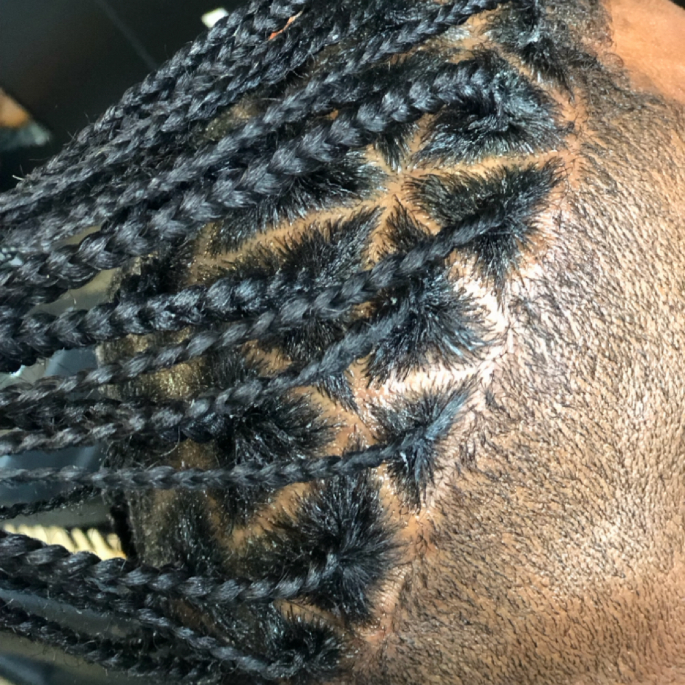 Triangle Individual Man Bun Braids at Miracle Hands Beauty LLC in Long Beach, CA