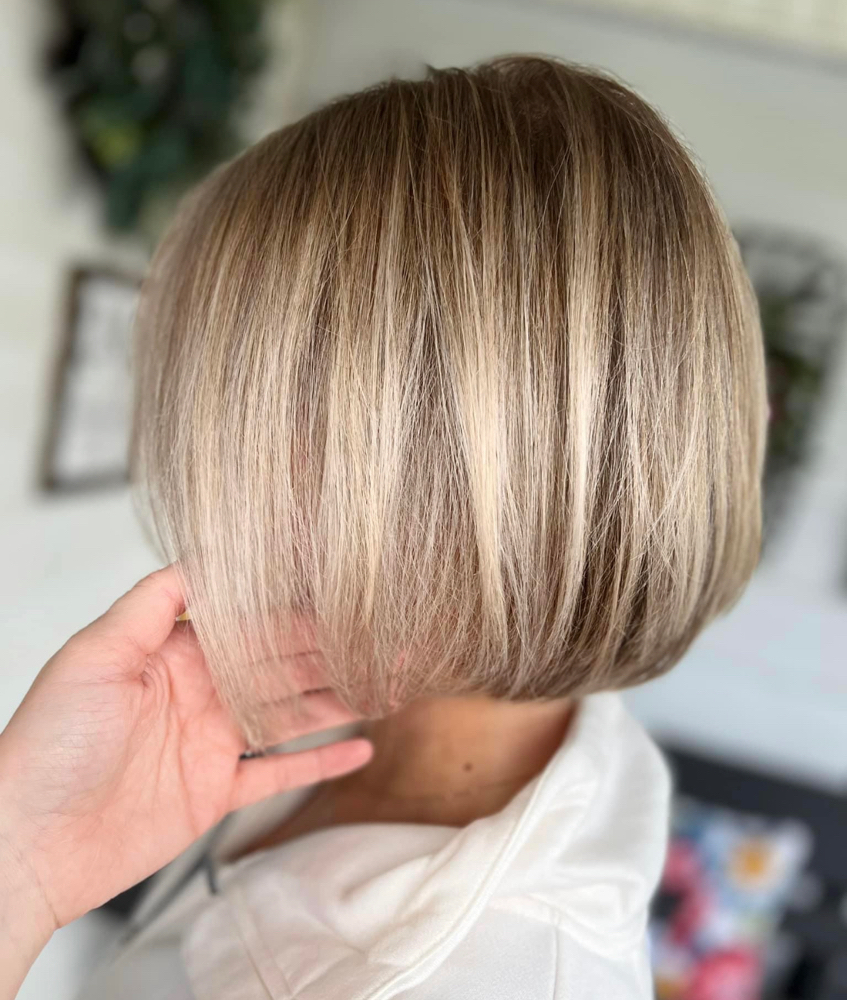Woman’s Dry Cut w/ Shampoo or Style