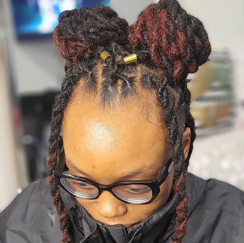 Two BUNS UPDO LOC STYLE