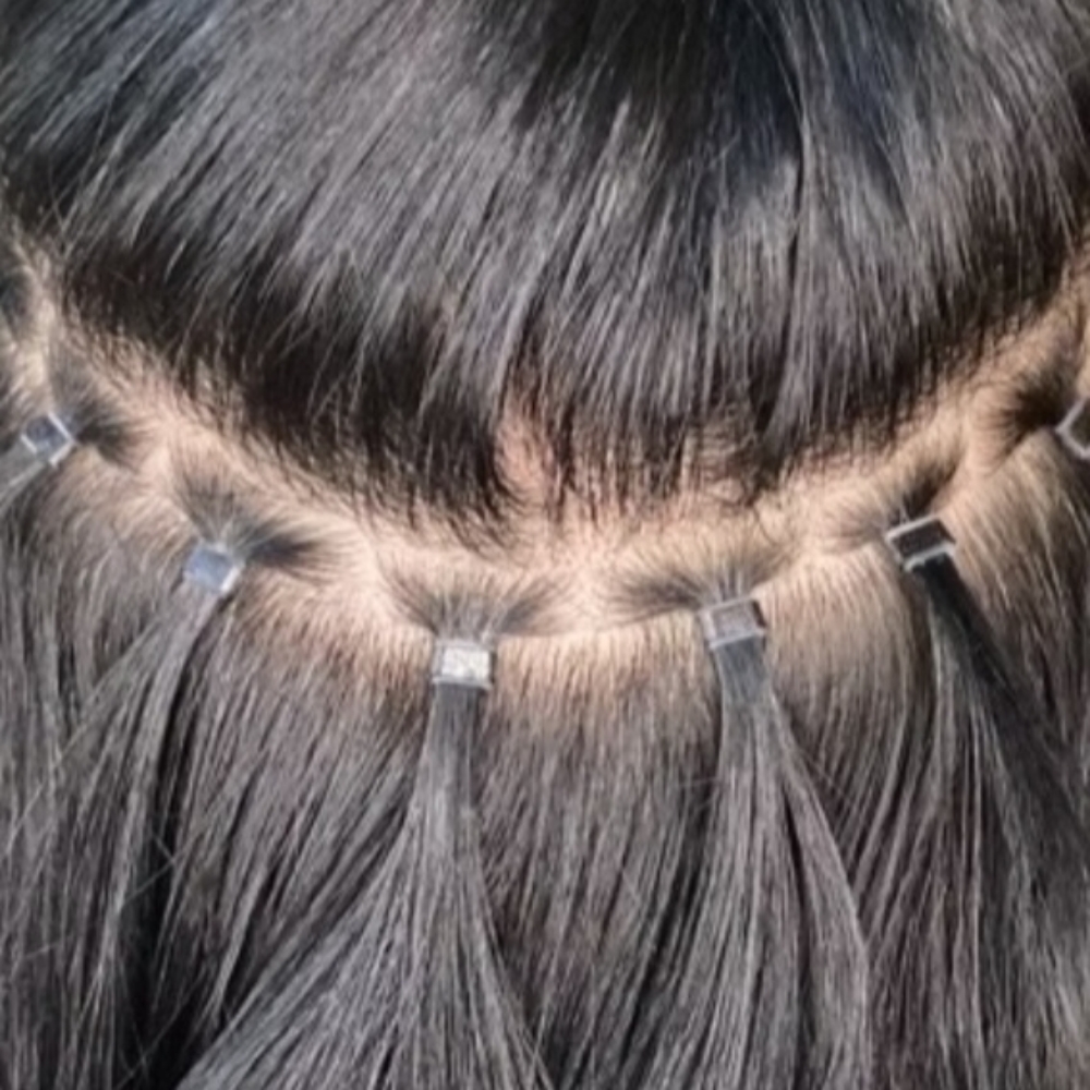 sewn beaded weft install at Lady A's Braids & Weaves Studio LLC in Humble, TX
