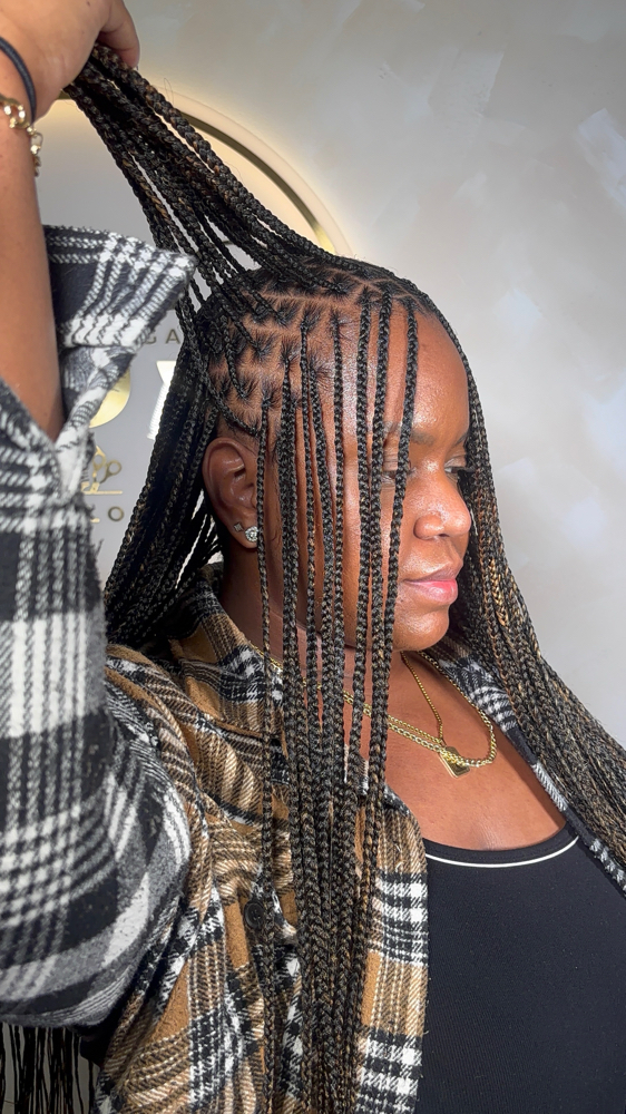 Smedium Knotless Waist Length Braid at SLAYEDBYGABBY in Charlotte, NC