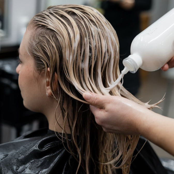 Conditioning treatment at I AM SALON, St. George in St. George, UT