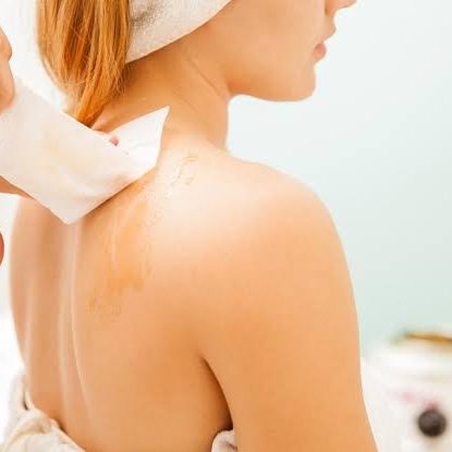 Back wax (half) at Aura Aesthetics in Houston, TX