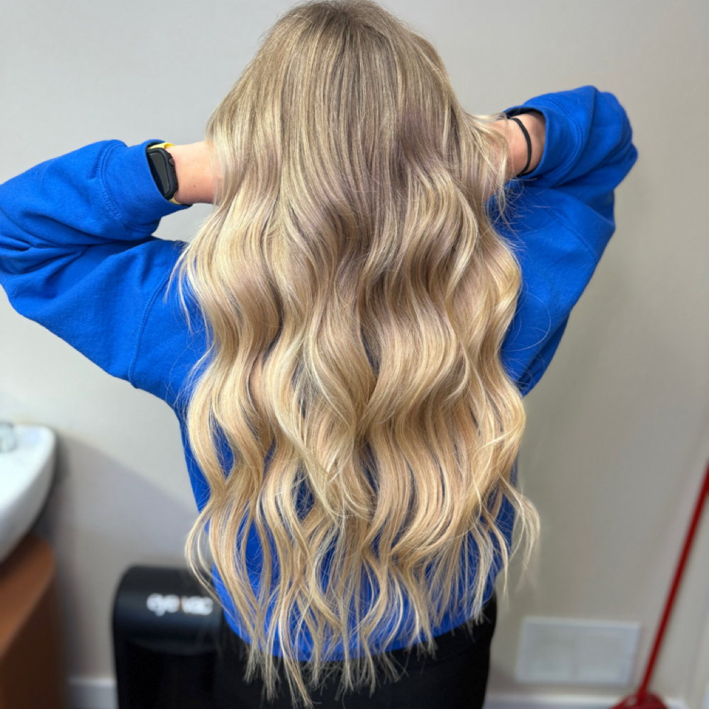 Hand Tied Extension Install at Beauty by Raigen Marie in Grayling, MI