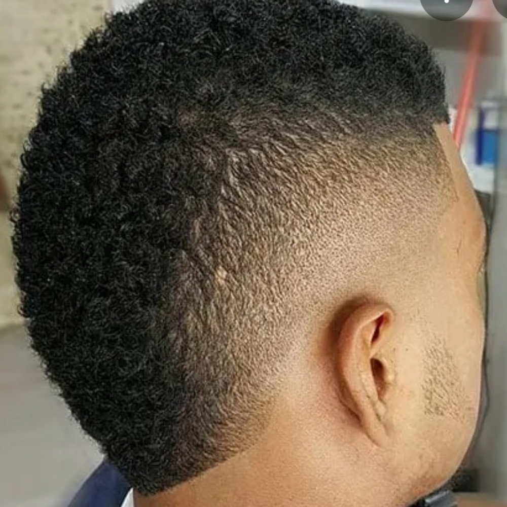 Mohawk at Man Cave Retreat Barbershop in Fort Myers, FL