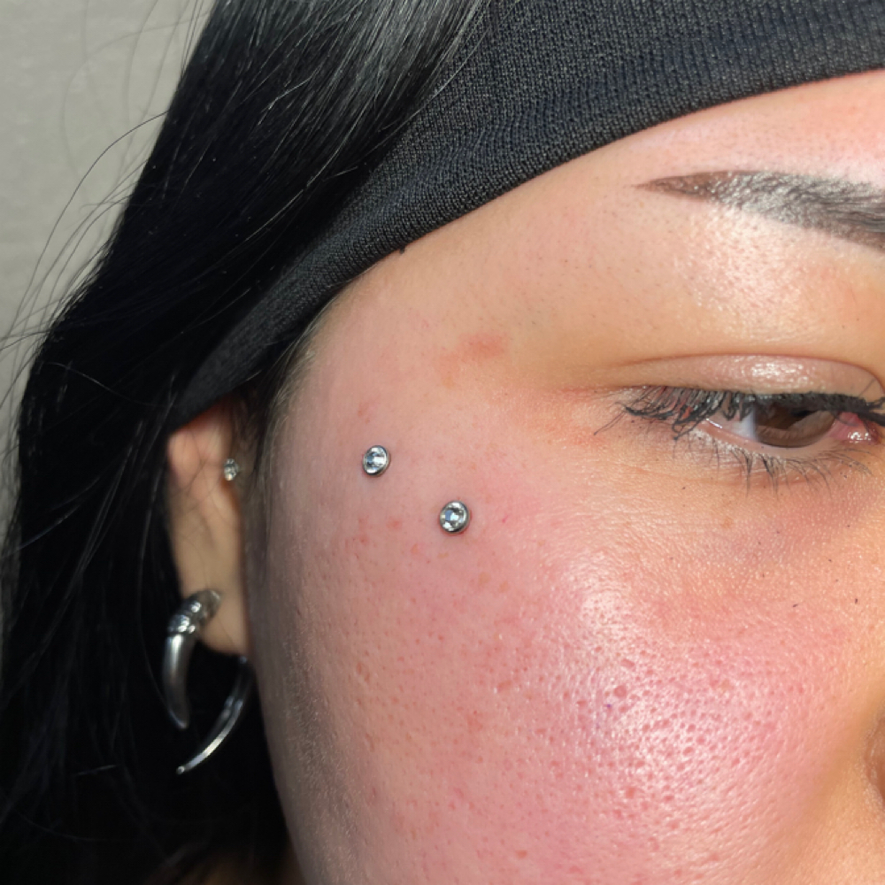 Anti-eyebrow (Surface Bar) at Piercedbyrayo in Clovis, CA