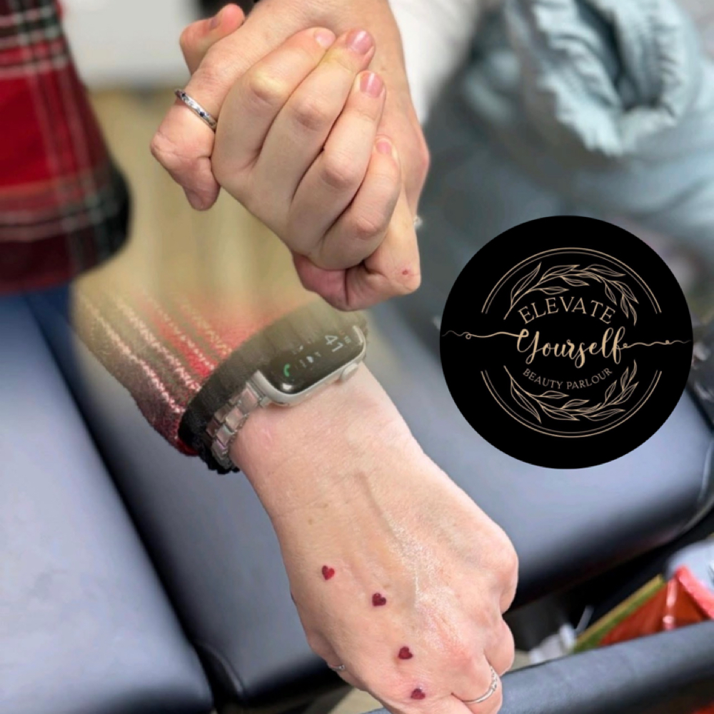 Viral Hand-Holding Tattoo