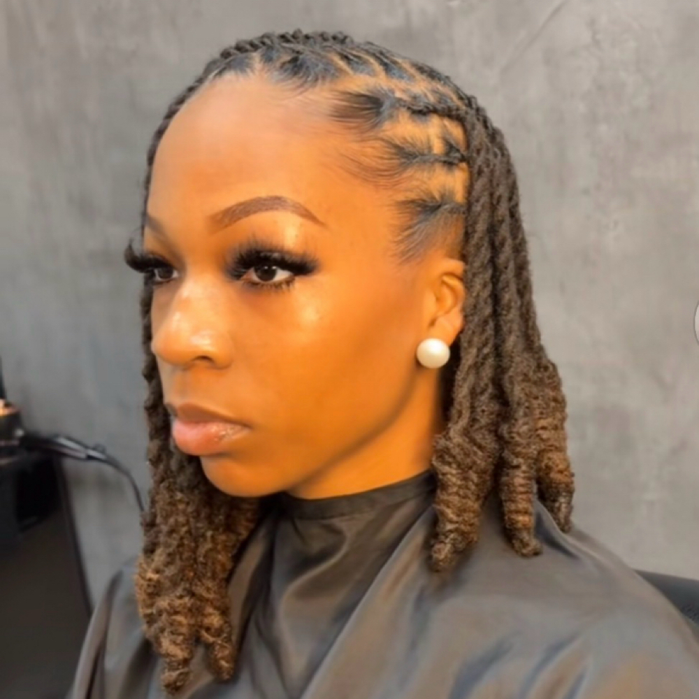 Dread Locs Wash And Style Restwist at Afrokreyol braiding salon in Plantation, FL