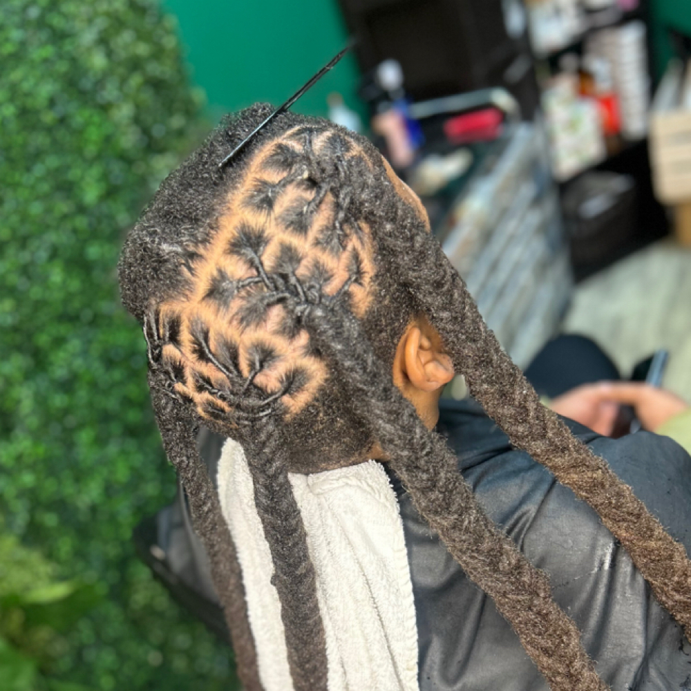 Mow-hawk/ Top Section at Nubian Creations LLC in Charlotte, NC