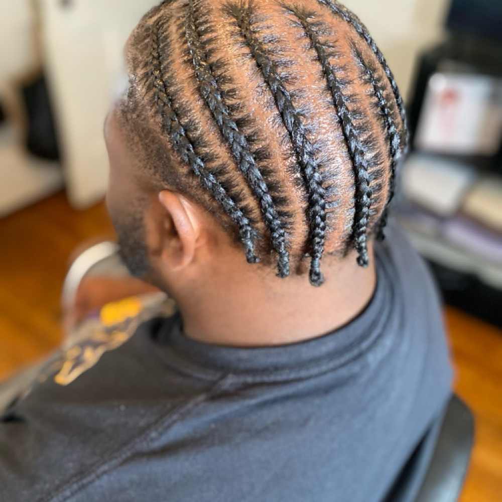 Men Stitch Braids at DLUXE Effect in Saint Louis, MO