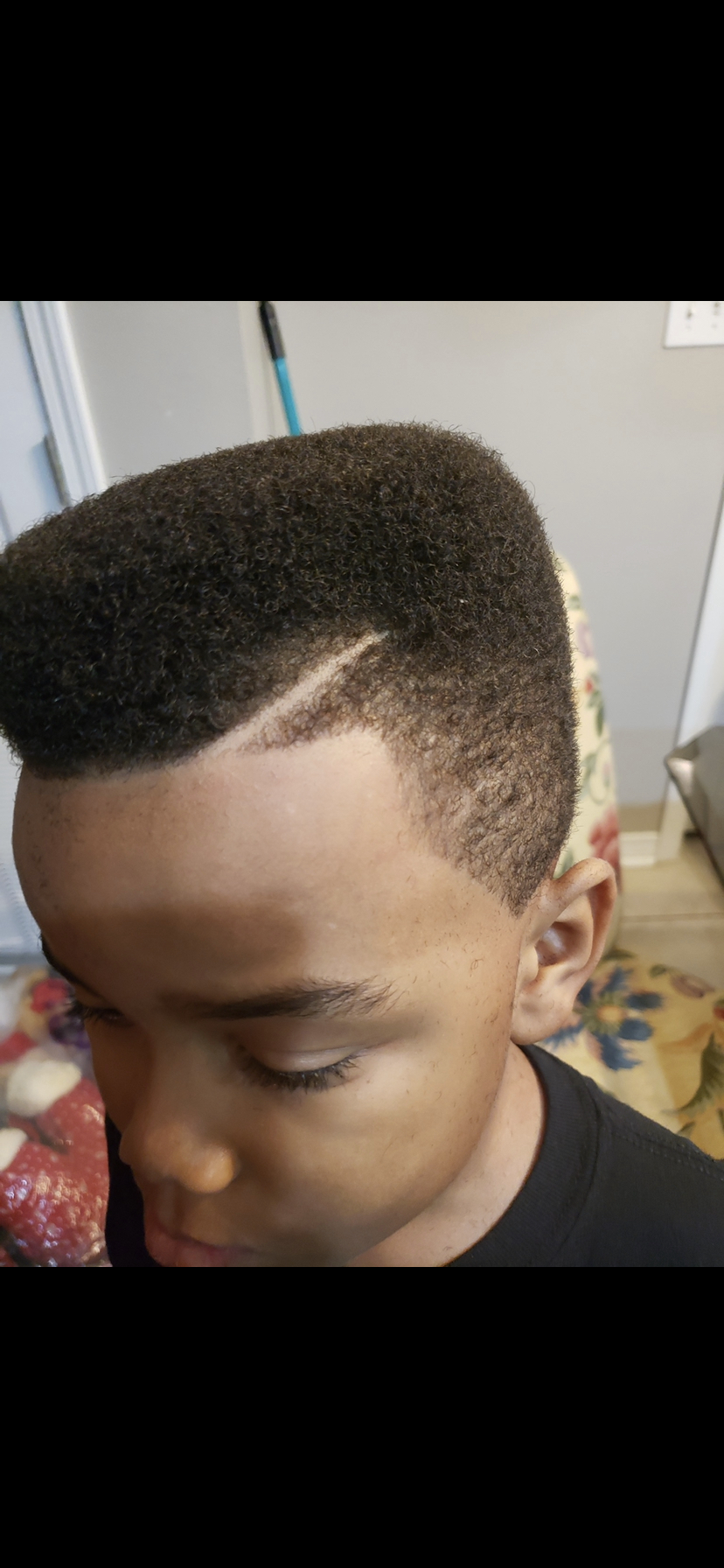 Child Haircut 10 and under W design at Qs Hot Headz Barbershop in Mobile, AL