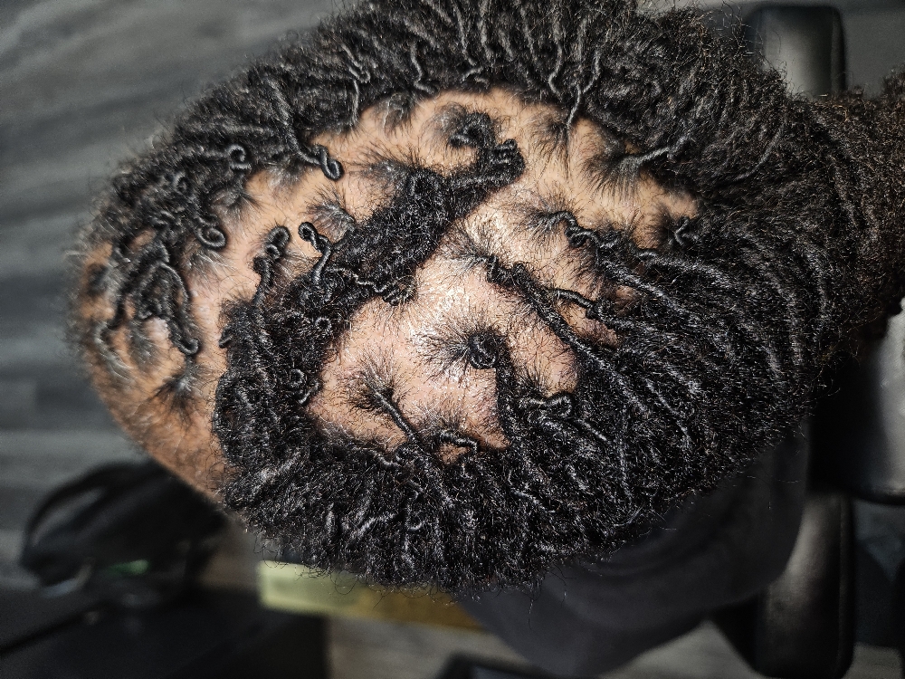 Loc Retwist w/ Carbon Tea Tree at NurishinSacredKnotts in Charlotte, NC