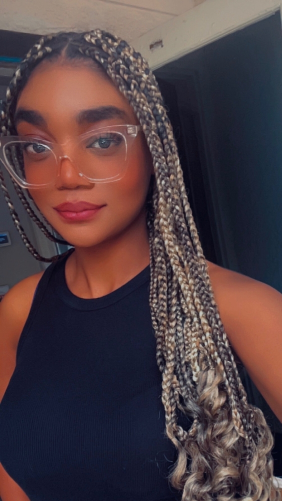 Box braids at BRAIDSBYLOVEJOY in Lewisville, TX