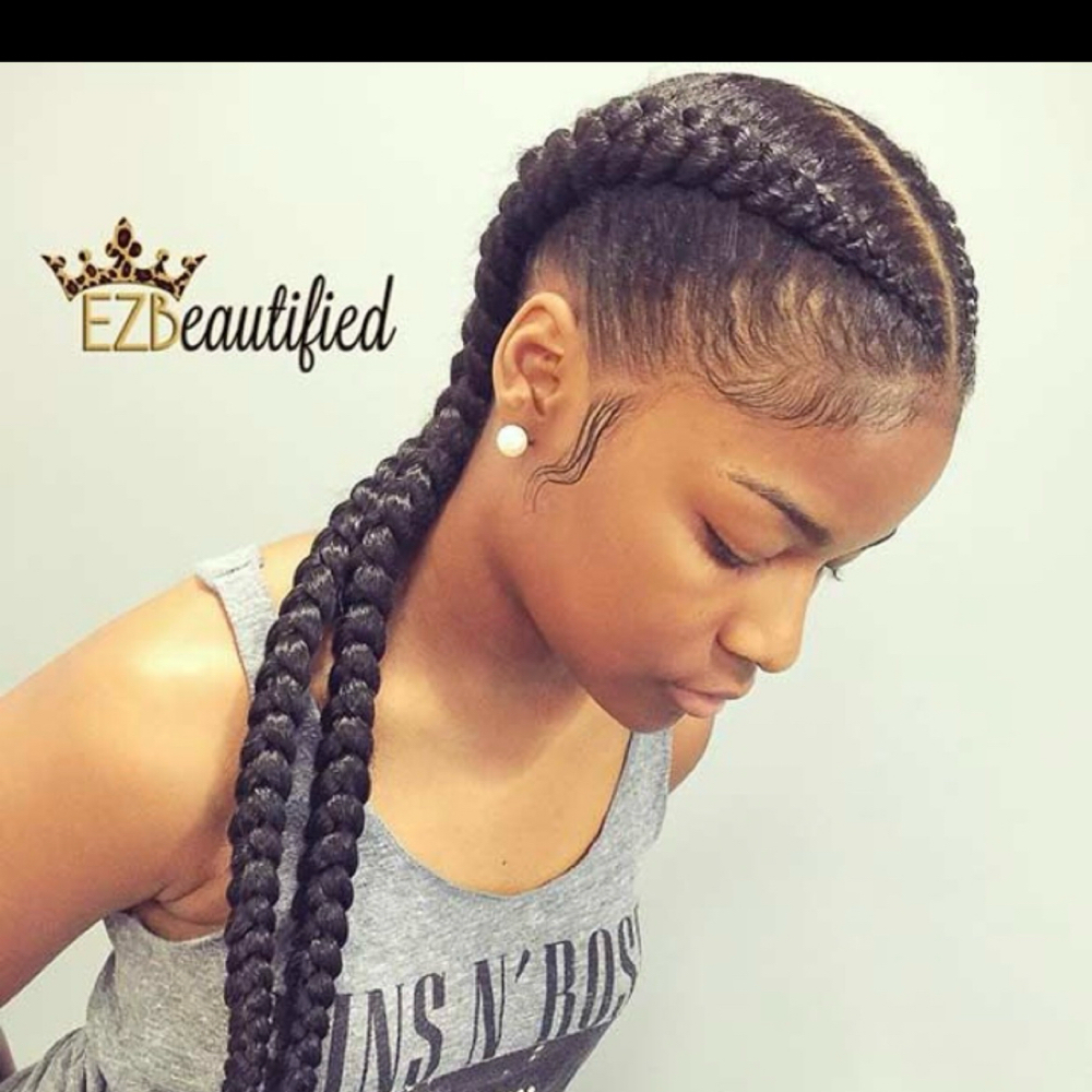 2 braids straight back: at Afrokreyol braiding salon in Plantation, FL