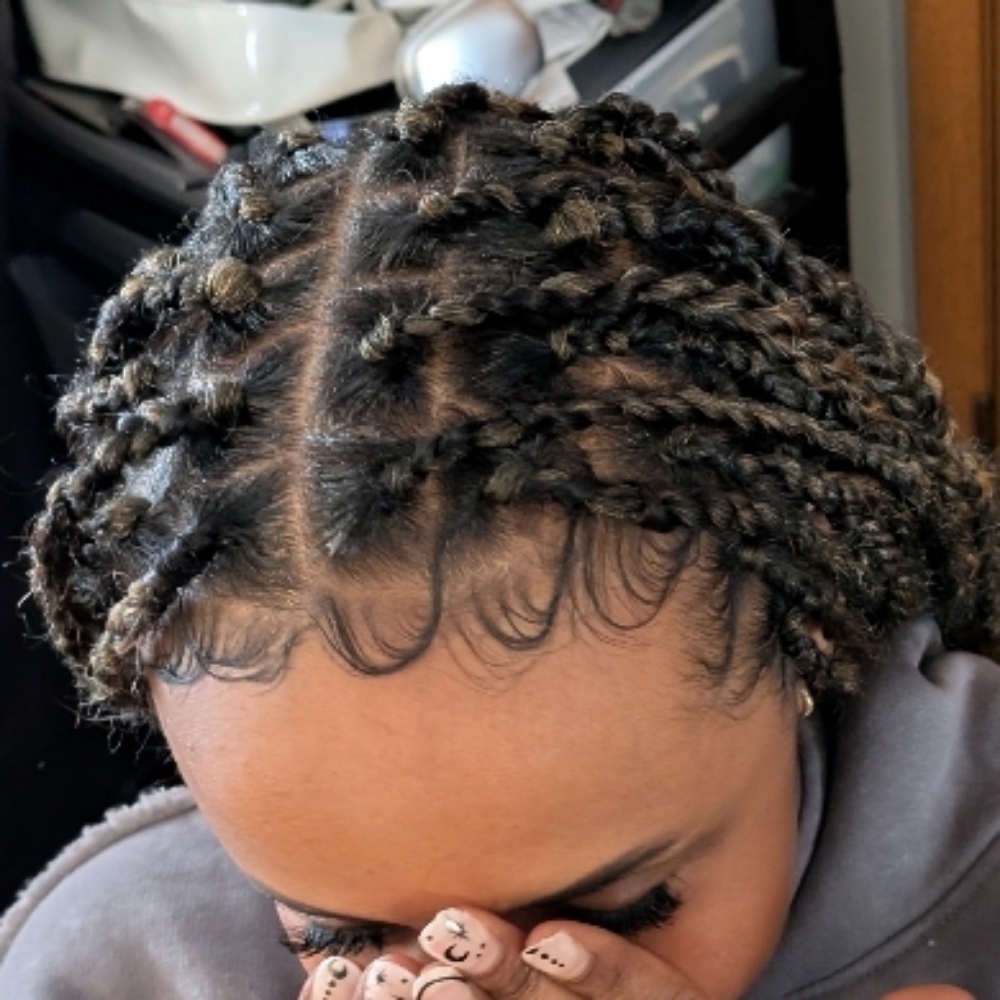 2 strand twist at Smiles & Styles in Sioux City, IA