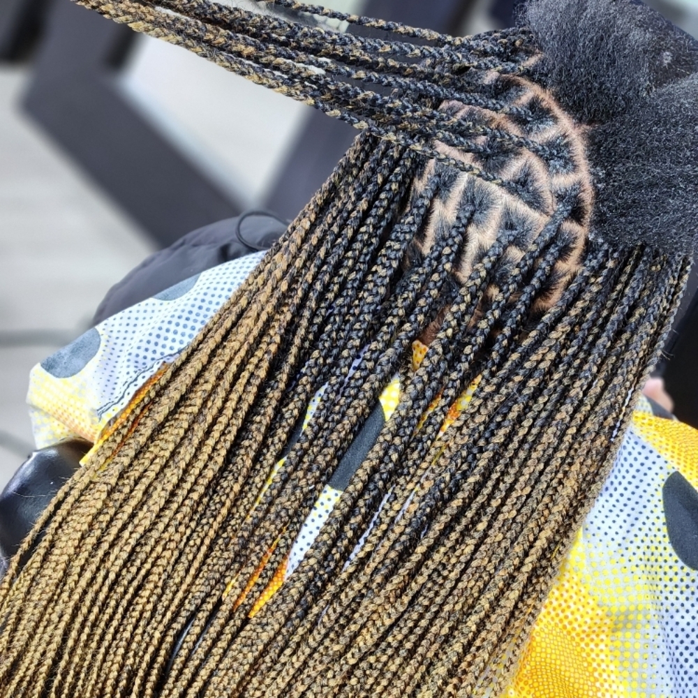 SMEDIUM KNOTLESS WAIST at MaryamuAfricanbraids in Newark, NJ