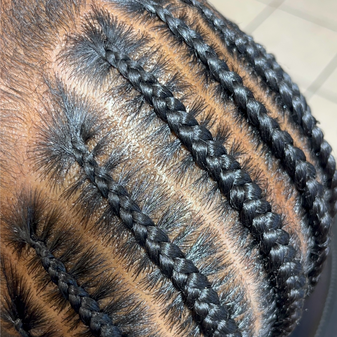 Straight Back Braids Natural Hair at BeYoutiful Beauty Barr in Houston, TX