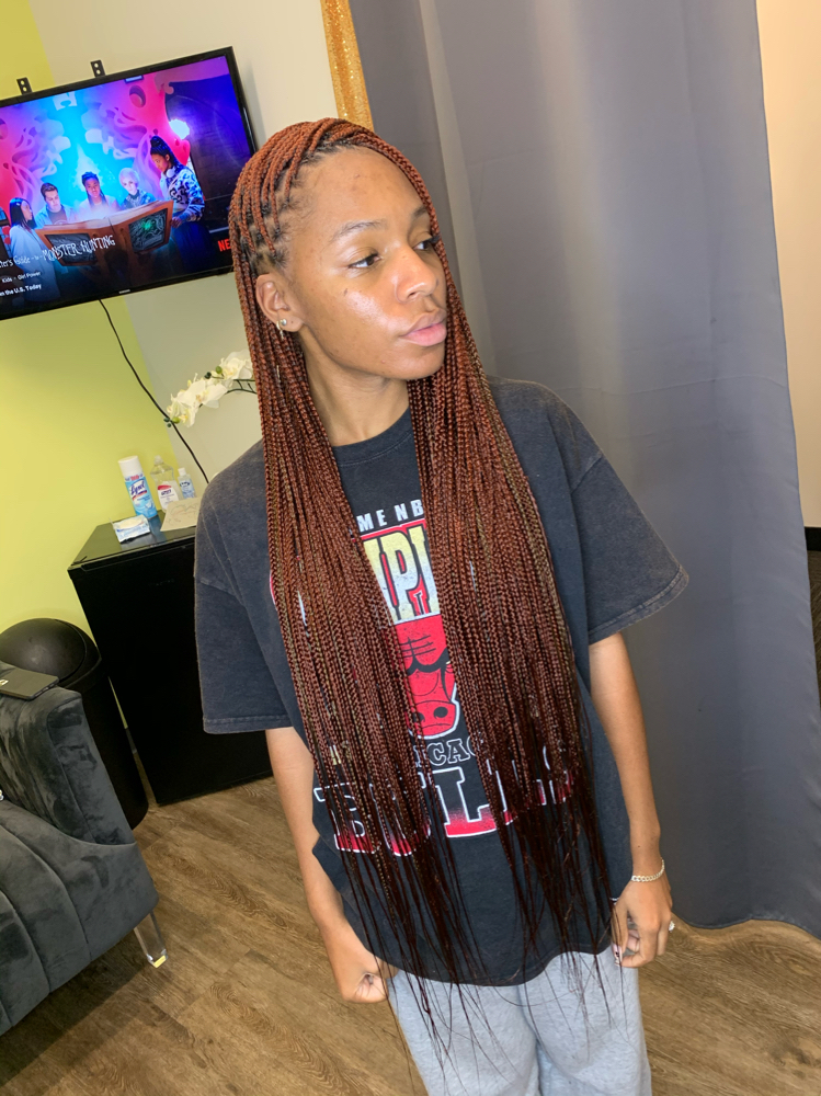 SMALL KNOTLESS BRAIDS WAIST LENGTH at Terrilashae in Chicago, IL