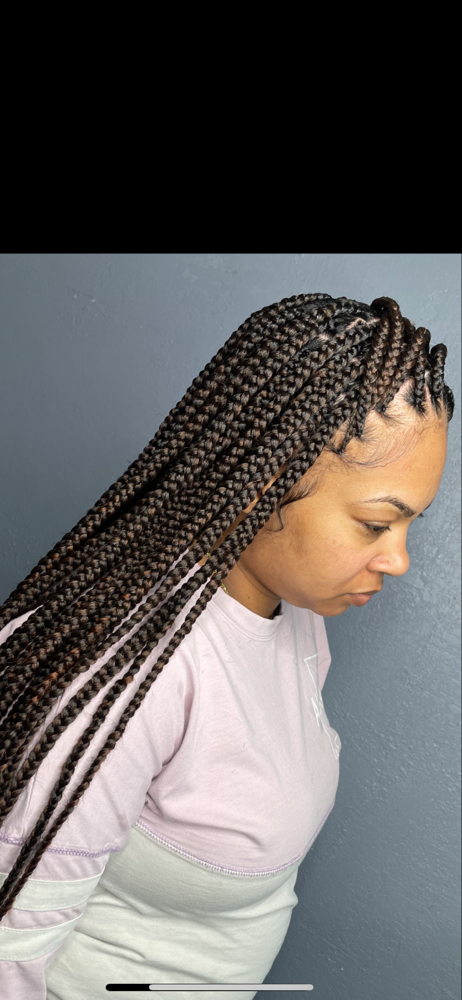 Smedium Knotless at HAIRBYREYA in Monroeville, AL
