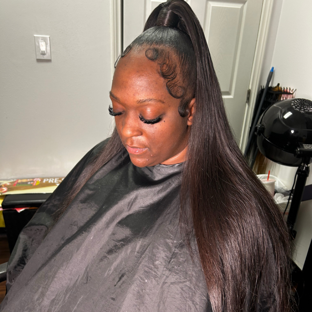 Half Up Half Down ( Sew In ) at Laurielle Mitchell in Arlington, TX