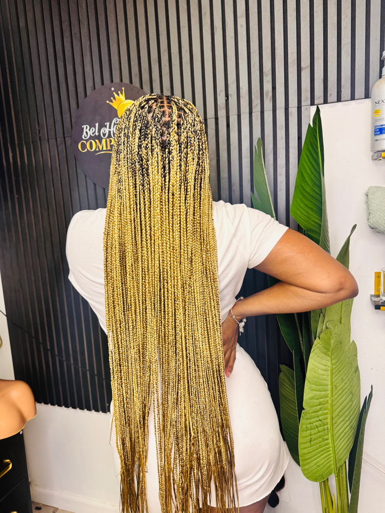 medium knotless ,midback at Bel hair company llc in orange, NJ