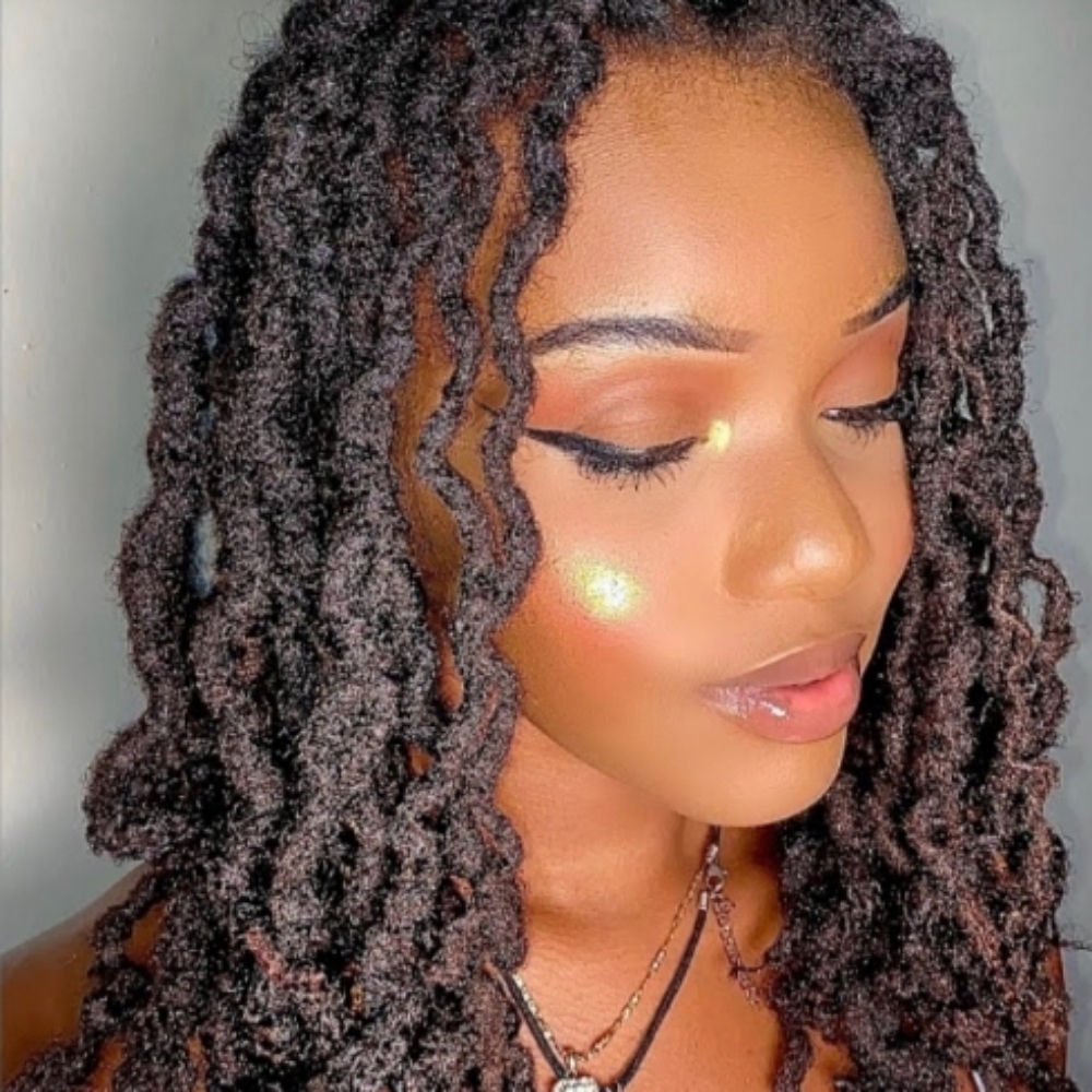 Loc Braid Out at Twistykinks & Twist of Elegance Esthetics in Jacksonville, AR