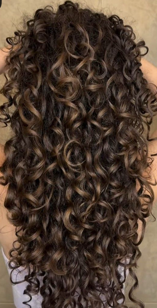 Smoothing Amika Curly Finish at Plush Beauty Bar in Hopewell Junction, NY