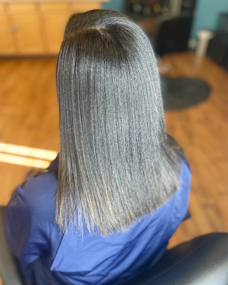 Flat Iron / Trim at Drea’s hair design in Oakland, CA