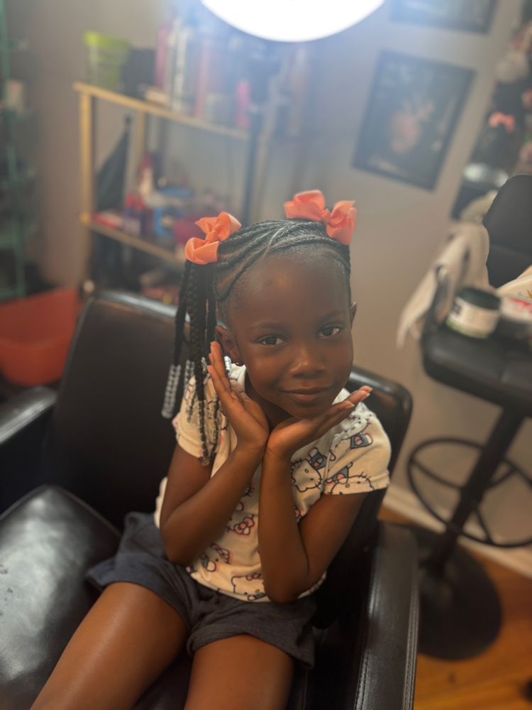 Feed in ponytails at BraidsByLici in Kansas City, MO