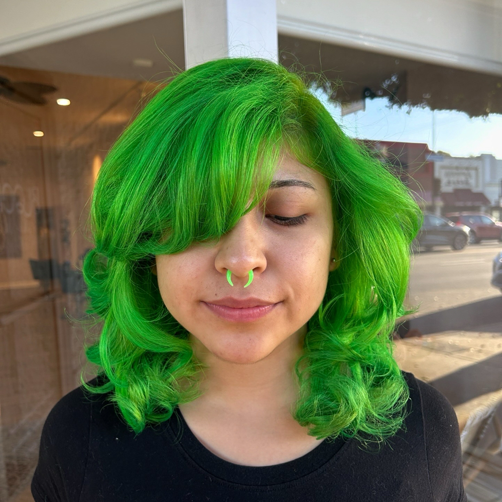 Bang Trim at Cuts By Cookie in Glendale, CA
