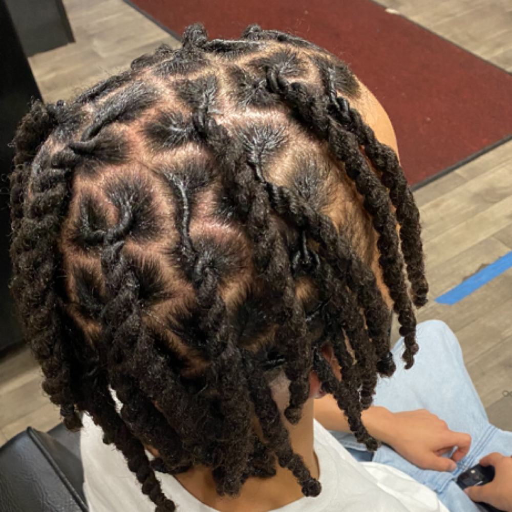 Shoulder Length Loc Retwist at Crowned Braids Salon in Conway, SC