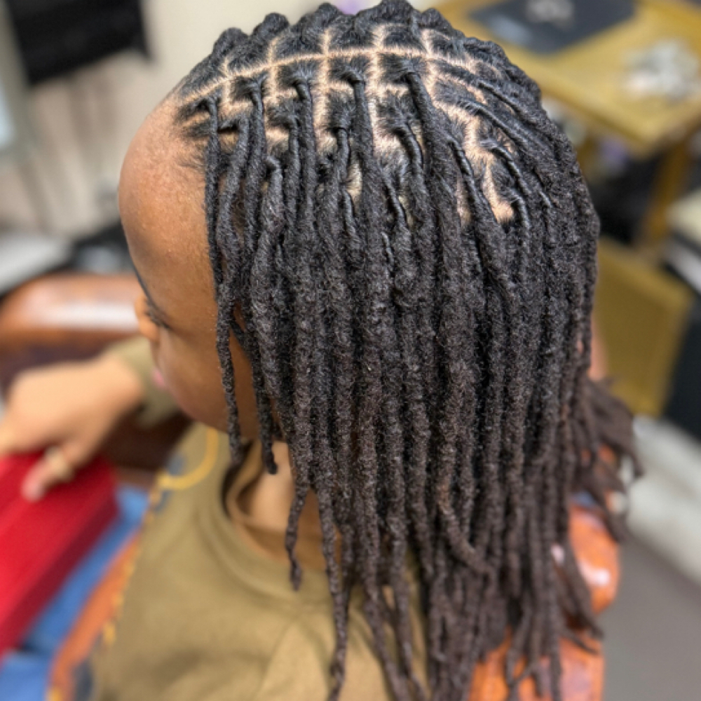 Loc Retwist/ Retie at Beauty Unleashed by Chatira in Norfolk, VA