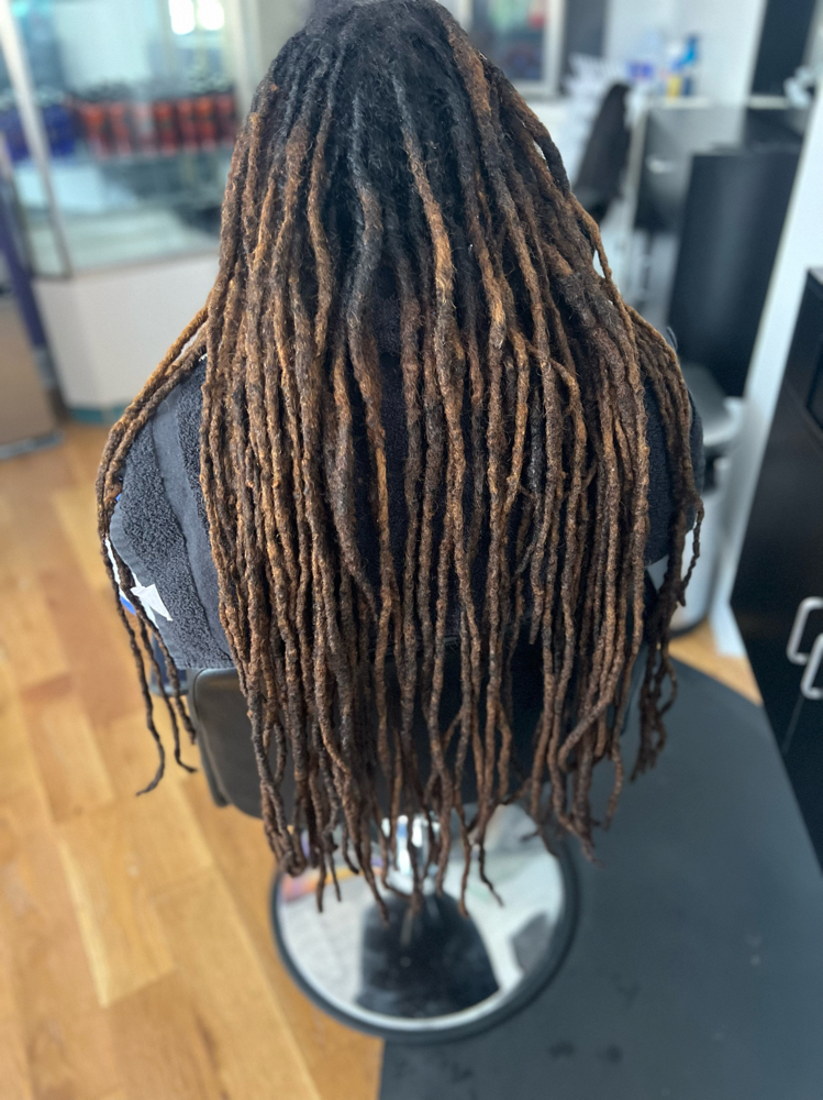 Loc Retwist Only (mid bk or longer)