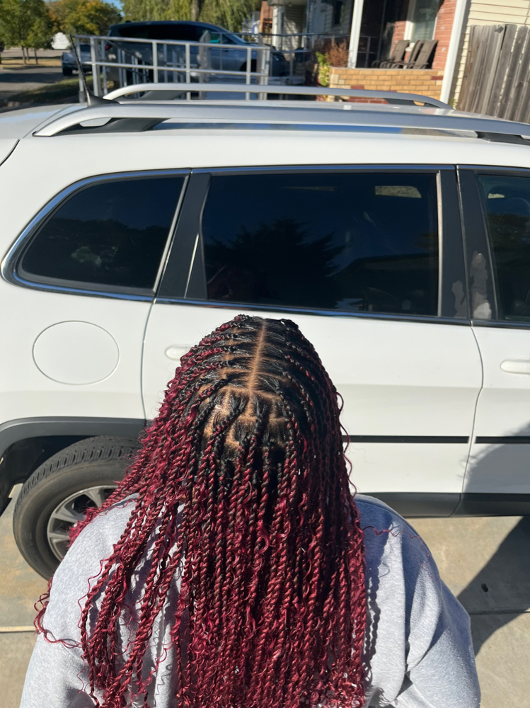 Bg at BraidsByJinece in Wichita, KS