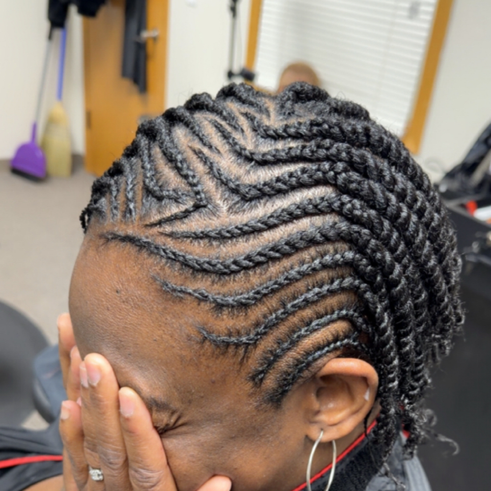 Medium Natural Twist No Extensions at DeeplyRootedSalon in Iowa City, IA